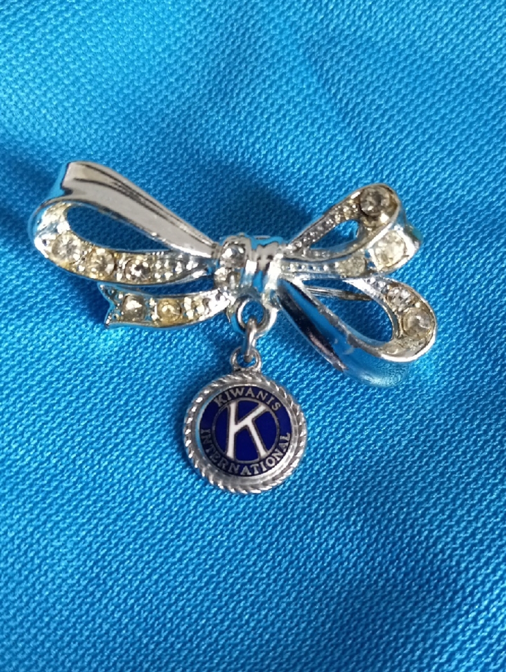 Kiwanis International Bow Charm Yellow Tone Rhinstone Brooch Pin